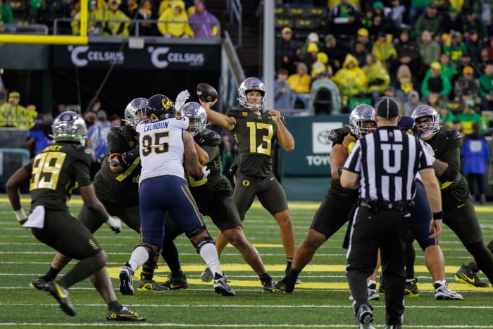 Oregon Ducks quarterback Ty Thompson throws a pass against the California Golden Bears.